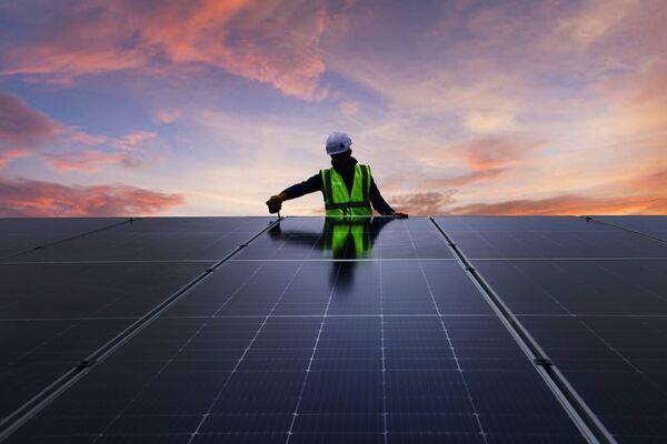 Ohk energy electrician installing solar panels. Ohk energy electrician installing solar panels.