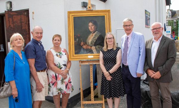 Pictured were Mary Torrie, Nicholas Walsh, Maria Walsh, Chair., Dunmore Heritage group, Tracy McEneany, Central Library, Eugene Broderick, Chair, Civic Trust and Brendan Grogan, Civic Trust. Included is a portrait of Nanette Malcomson. Photo: John Power