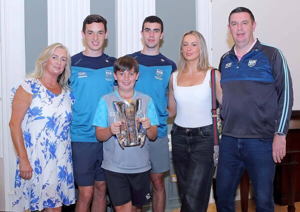 Waterford minor hurling team members, twins Shane and Conor Power are pictured with the Irish Press cup and parents David Power and Laura Coady, brother Emmett and sister Eve Power.