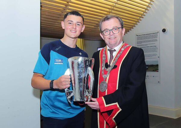  The Mayor of Waterford City &amp; County, Cllr.Seamus Ryan pictured with the Waterford minor hurling captain James Comerford and the Irish Press Cup at the civic reception for the team and management on Thursday last in City Hall.