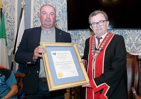 The Waterford minor hurling manager, James O'Connor, was presented with a framed scroll marking the occasion of the civic reception for the team by the Mayor of Waterford City &amp; County, Cllr.Seamus Ryan
