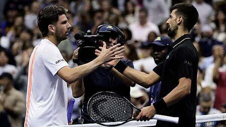 Novak Djokovic overcomes back issue to cruise past Cameron Norrie at US Open