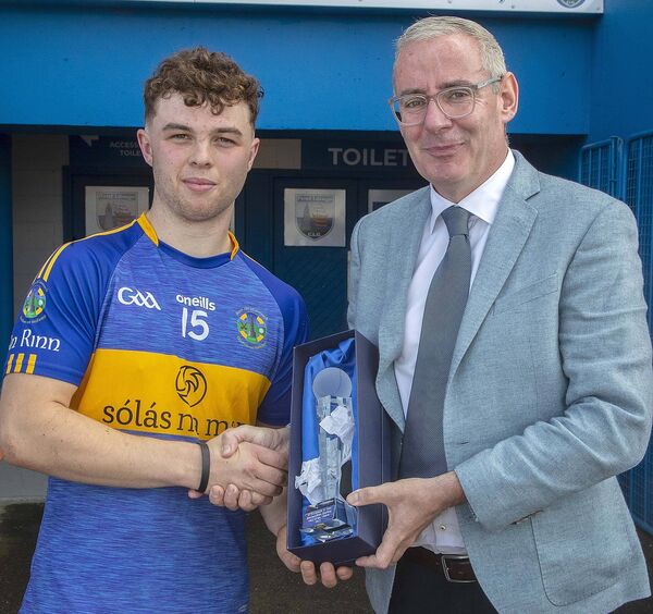 Neil Moore Chairman Waterford GAA Board presents the Man of the Match Award to An Rinn’s Liam O Siothchain. Neil Moore Chairman Waterford GAA Board presents the Man of the Match Award to An Rinn’s Liam O Siothchain.