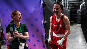 <p>Irish boxer Kellie Harrington celebrates with coach Lynne McEnery.</p>