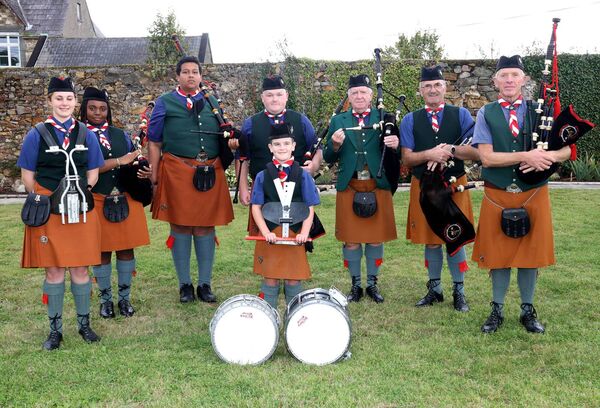 Members of the De La Salle Piped Band, at the official re-opening of the Sacred Heart Scout Den. Photo: Joe Evans