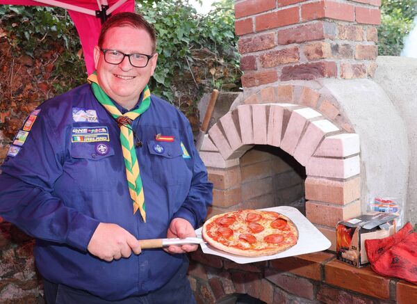 Seamus Howley, at the (Cistine) Pizza Oven he built, at the official re-opening of the sacred Heart Scout Den. Photo: Joe Evans