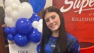 <p>Matilda pictured with her U16 All-Ireland camogie shield medal </p>