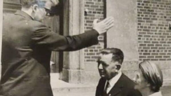 Fr Bartholomew Kiely giving the first blessing after his ordination to his parents, Dr Patrick Kiely (a native of Moonakirka) and Christina Kiely. Pic: Stradbally Photographic Archive - Courtesy of Aidan Coffey) Fr Bartholomew Kiely giving the first blessing after his ordination to his parents, Dr Patrick Kiely (a native of Moonakirka) and Christina Kiely. Pic: Stradbally Photographic Archive - Courtesy of Aidan Coffey)