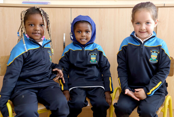 Jayeux, Dalal and Jasmine, who started school at Presentation Primary School. Photo: Joe Evans Jayeux, Dalal and Jasmine, who started school at Presentation Primary School. Photo: Joe Evans