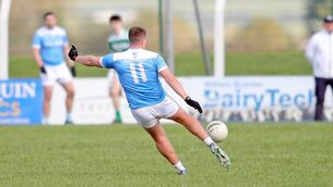 <p>Roanmore's Billy Nolan lets a late late free kick fly from the outside of his boot to secure a two point score which gave Roanmore the win over Abbeyside/Ballinacourty in the JJ Kavanagh &amp; Sons Co. Senior football Championship. Photo: Eddie Dee</p>