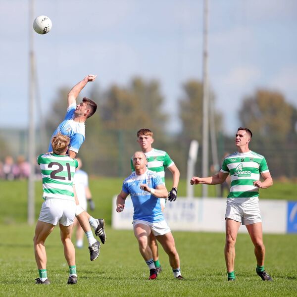 Roanmore's Eoghan Barry rises to punch away a high ball. Roanmore's Eoghan Barry rises to punch away a high ball.