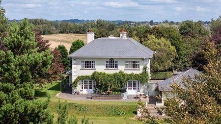 Waterford Property: Elegant living on 2.4 acres close to the city