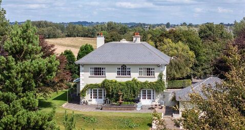 Waterford Property: Elegant living on 2.4 acres close to the city
