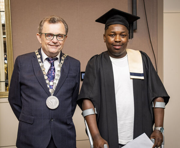  Mayor of Waterford City &amp; County Cllr. Seamus Ryan and Junior Ngube, Healthcare Support, at Waterford College of Further Education, Graduation &amp; Awards Ceremony. Photo: Joe Evans