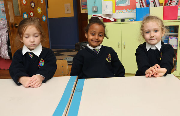  Young pupils who started big school at Our Lady of Mercy. 	All Photos: Joe Evans