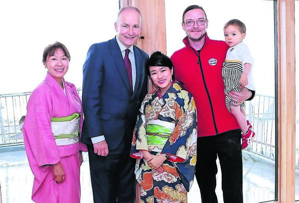 Taoiseach, Micheál Martin pictured with Sonomi Leslie, Keith, Ayuko and Jinto Guinan, Keith is an employee of Lafcadio Hearn Japanese Gardens. Photo: Noel Browne