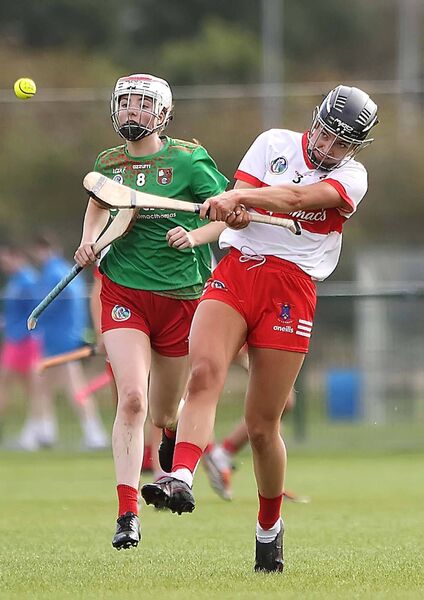 De La Salle's Keeley Corbett-Barry gets away from St Anne's Hannah McGrath.