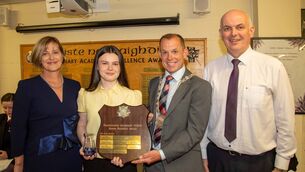 <p>Senior Business and Accounting Award: From left, Sally Ronayne (Principal), Holly Power, Cllr Frank Quinlan, Deputy Mayor and Vivian Lonergan (Business Studies teacher). Photo: John Power</p>