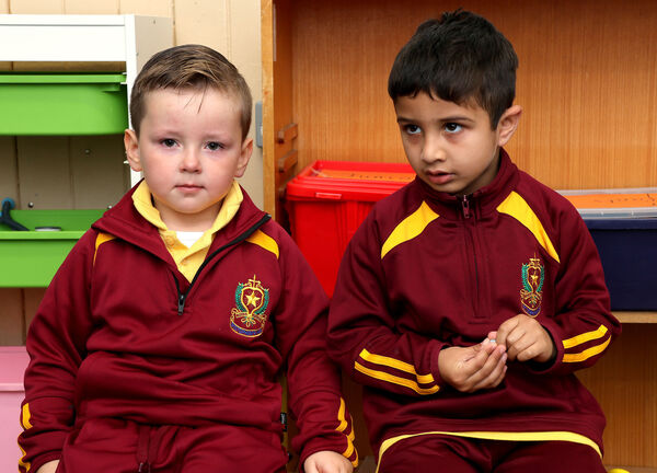 Timmy and Saad, who started school at St. Stephen's De La Salle. Photo: Joe Evans Timmy and Saad, who started school at St. Stephen's De La Salle. Photo: Joe Evans