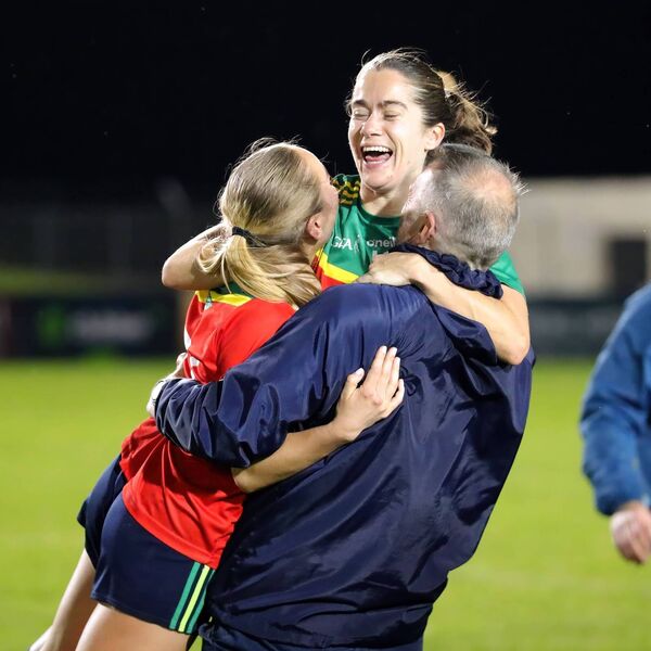 Comeragh Rangers manager Ger Power celebrates with Aoife Murray and Kate Hahessy at the final whistle.