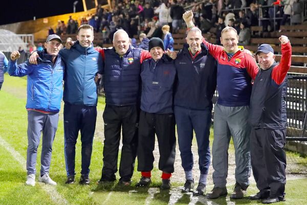 Comeragh Rangers management team are all smiles after their side retained the WLGFA Senior title.