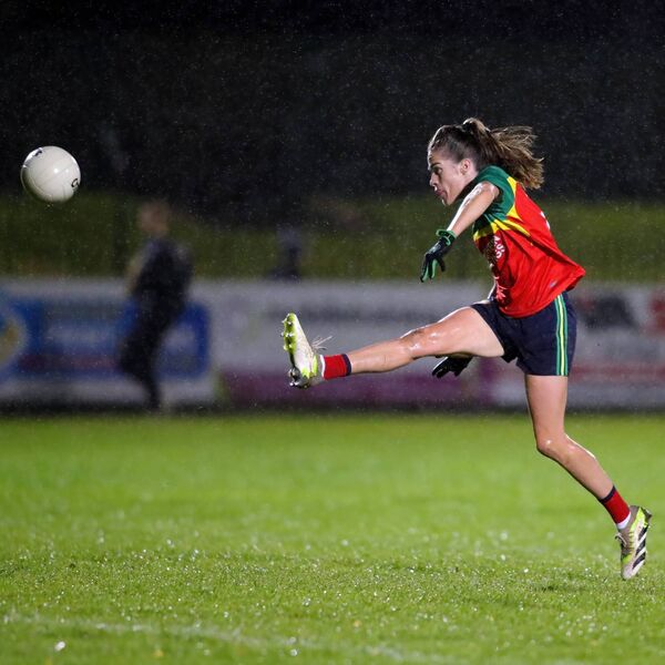 Comeragh Rangers Emma Murray manages to fire over a point despite the underfoot conditions.