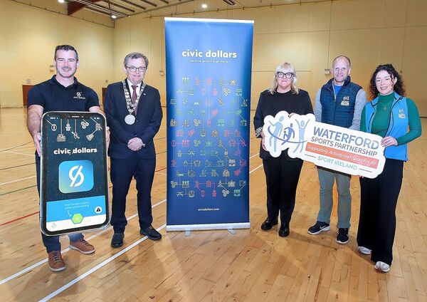Mayor of Waterford City and County, Cllr. Seamus Ryan is pictured at the launch of the Civic Dollars initiative in Kingfisher Club with Stephen McPeake, Founder & CEO, Civic Dollars, Lauren Walsh-Kett, Waterford Sports Partnership, Sinead Breathnach, Senior Executive Officer, Community & Sports, Waterford City and County Council, and David Abbott, Waterford Sports Partnership. Mayor of Waterford City and County, Cllr. Seamus Ryan is pictured at the launch of the Civic Dollars initiative in Kingfisher Club with Stephen McPeake, Founder & CEO, Civic Dollars, Lauren Walsh-Kett, Waterford Sports Partnership, Sinead Breathnach, Senior Executive Officer, Community & Sports, Waterford City and County Council, and David Abbott, Waterford Sports Partnership.