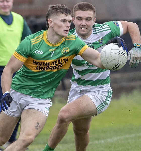 Kilrossanty's Darragh Walsh in possession, with Ballinacourty's Charlie Treen giving chase. Kilrossanty's Darragh Walsh in possession, with Ballinacourty's Charlie Treen giving chase.