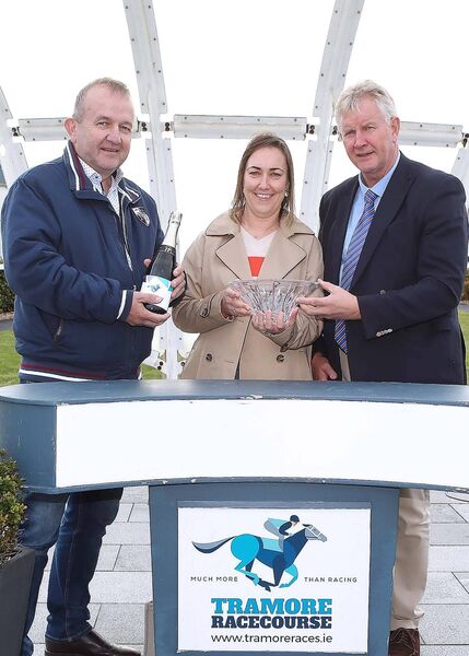 Owners Pauline Eager and Matt Neville are presented with the winners prize after the Willie Mullins trained May Call You Back, ridden by Brian Hayes, won the Pickardstown Handicap Chase. Owners Pauline Eager and Matt Neville are presented with the winners prize after the Willie Mullins trained May Call You Back, ridden by Brian Hayes, won the Pickardstown Handicap Chase.