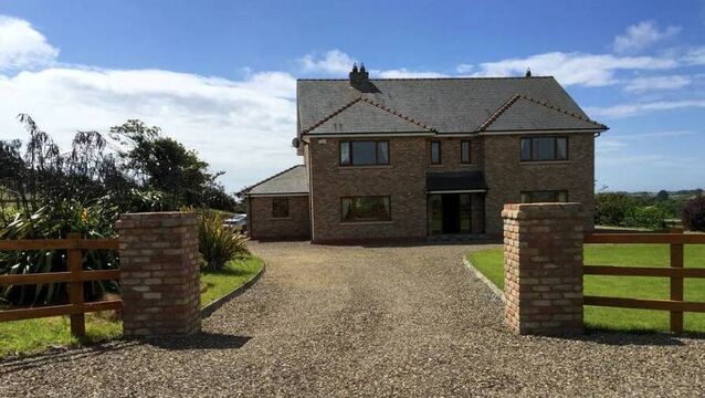 Waterford Property: Beautiful three-story red-brick residence in peaceful rural setting