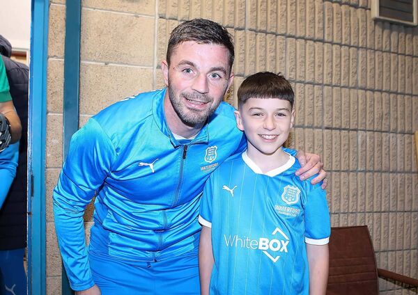 Waterford FC captain Padraig Amond pictured with mascot James Troy, Park Rangers FC. Waterford FC captain Padraig Amond pictured with mascot James Troy, Park Rangers FC.