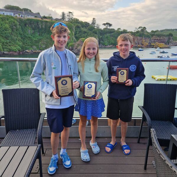 Optimist Club Champions- Ethan, Lilly and Hugo. Optimist Club Champions- Ethan, Lilly and Hugo.