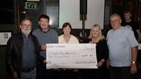 Newtown fundraising committee marks two decades of IKA support
