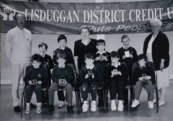 Lisduggan Credit Union Pupil of the Year Award to St. Paul's Junior School Infants to 2nd class. Back, Noel Walsh, LCU, David O'Sullivan, Shane Daly, Mary Murphy, LCU, John Doyle, Erek English and Peggy Murphy, Principal. Front, Brian Keller, Michael Tobin, Niall O'Brien, Marc Ryan and Stephen Quilty. Lisduggan Credit Union Pupil of the Year Award to St. Paul's Junior School Infants to 2nd class. Back, Noel Walsh, LCU, David O'Sullivan, Shane Daly, Mary Murphy, LCU, John Doyle, Erek English and Peggy Murphy, Principal. Front, Brian Keller, Michael Tobin, Niall O'Brien, Marc Ryan and Stephen Quilty.
