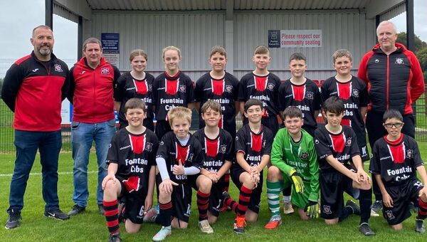 The Portlaw Utd U13s who played in the Terry Butler Trophy. Back Row L-R: Stephen Devereux(Coach), Colm Nugent(Coach), Taylor Flannery, Lily Kinsella, Luke Devereux(Captain), Finn Kirwan, Darragh O’Connor, Seán Maher, Seamus Maher(Coach). Front Row L-R: Alex Roche, Evan Kiely, Colm Nugent, Connor O’Donoghue, Brian Grant, Ryan Power, Tommy Dunphy. The Portlaw Utd U13s who played in the Terry Butler Trophy. Back Row L-R: Stephen Devereux(Coach), Colm Nugent(Coach), Taylor Flannery, Lily Kinsella, Luke Devereux(Captain), Finn Kirwan, Darragh O’Connor, Seán Maher, Seamus Maher(Coach). Front Row L-R: Alex Roche, Evan Kiely, Colm Nugent, Connor O’Donoghue, Brian Grant, Ryan Power, Tommy Dunphy.