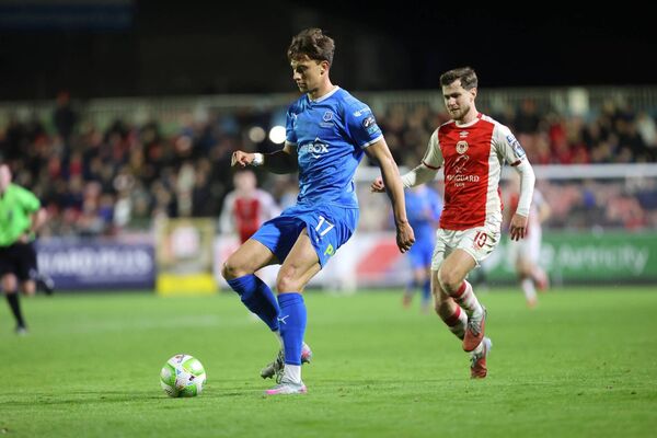 Waterford FC defender Kacper Radkowski in control ahead of St. Pat's Barry Baggley. Waterford FC defender Kacper Radkowski in control ahead of St. Pat's Barry Baggley.
