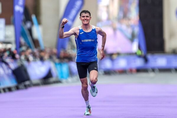 David McGlynn of Waterford AC on his way to crossing the finish line to win the men's national title at the 2025 Irish Life Dublin Marathon. David McGlynn of Waterford AC on his way to crossing the finish line to win the men's national title at the 2025 Irish Life Dublin Marathon.
