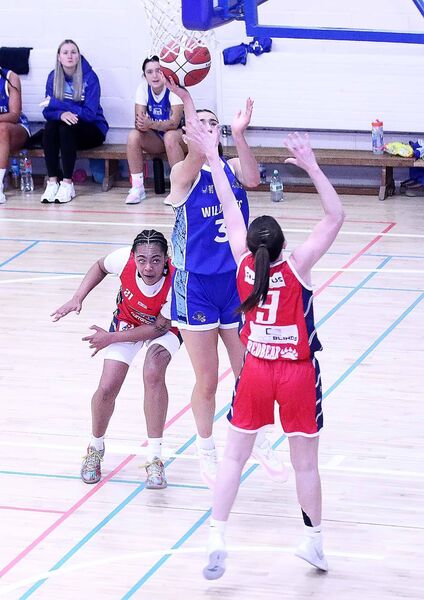 Wildcats Kate Hickey scores her first two pointer of the night. Wildcats Kate Hickey scores her first two pointer of the night.