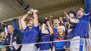 <p>Mount Sion captain Mikey Daykin holds the Intermediate Football Cup high following the presentation by Neil Moore, Chairman Co. GAA Board much to the delight of his team mates.</p> <p>Mount Sion captain Mikey Daykin holds the Intermediate Football Cup high following the presentation by Neil Moore, Chairman Co. GAA Board much to the delight of his team mates.</p>