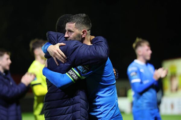 Waterford FC's Padraig Amond embraces Navajo Bakboord at the end of the game. Waterford FC's Padraig Amond embraces Navajo Bakboord at the end of the game.