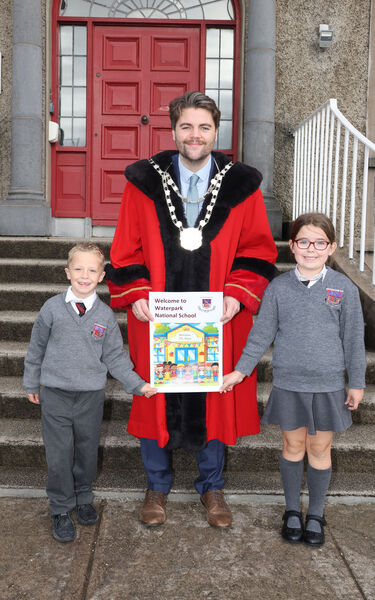 Metropolitan Mayor of Waterford Cllr. Adam Wyse, annul school visits, on his visit to Waterpark NS Zach and Molly presented him with a Welcome Card. Photo: Joe Evans  Metropolitan Mayor of Waterford Cllr. Adam Wyse, annul school visits, on his visit to Waterpark NS Zach and Molly presented him with a Welcome Card. Photo: Joe Evans
