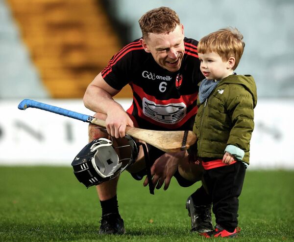 Ballygunner's Philip Mahony with his son Harry after the game against Na Piarsaigh. Ballygunner's Philip Mahony with his son Harry after the game against Na Piarsaigh.