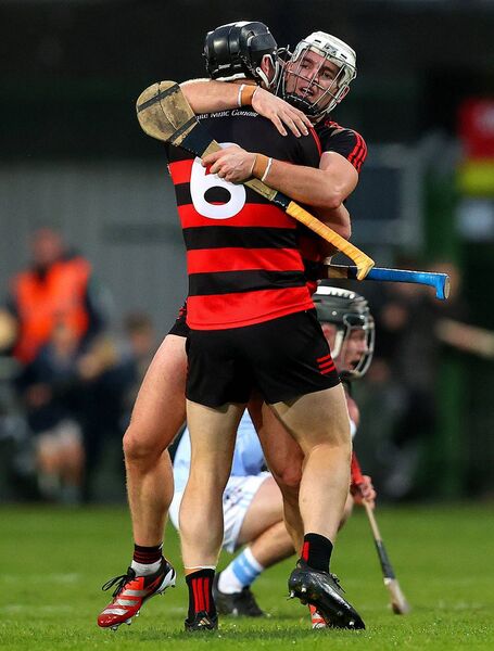 Ballygunner's Philip Mahony and Dessie Hutchinson celebrate after the game.