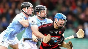 <p>Ballygunner's Paddy Leavey under pressure from Na Piarsaigh's Kevin Downes and Conor Boylan during their AIB Munster Club Senior Hurilng Championship clash at the TUS Gaelic Grounds in Limerick. Photos: INPHO/Tom O'Hanlon</p>