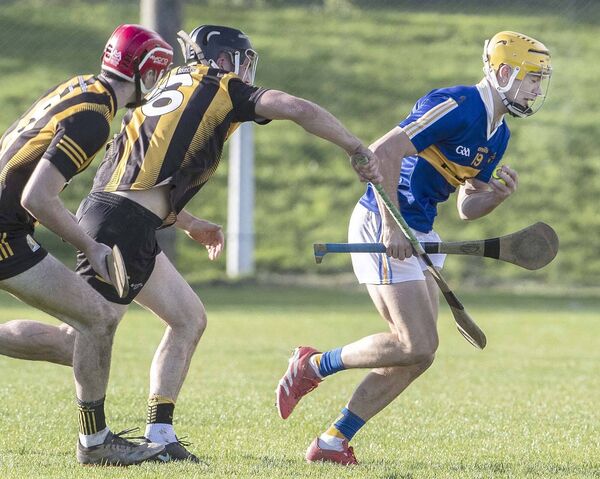 Tallow's Callum McCarthy gets away from the challenge of Garryspillane’s Dylan O’Shea during their AIB Munster Club Intermediate Hurling match played at Cappoquin Logistics Fraher Field. Photos: Sean Byrne