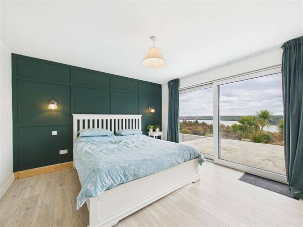 The impressive property is in an idyllic setting 