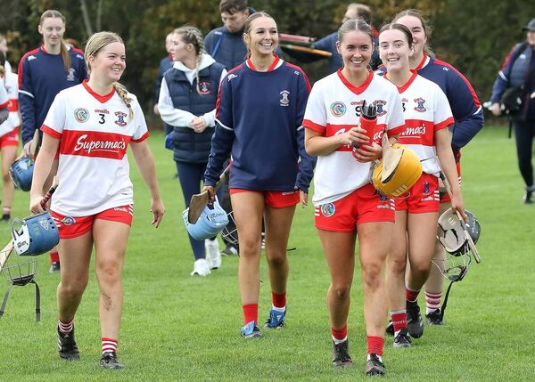 All smiles as the De La Salle team leave the pitch after they beat Thurles Sarsfields to qualify for the Munster final.
