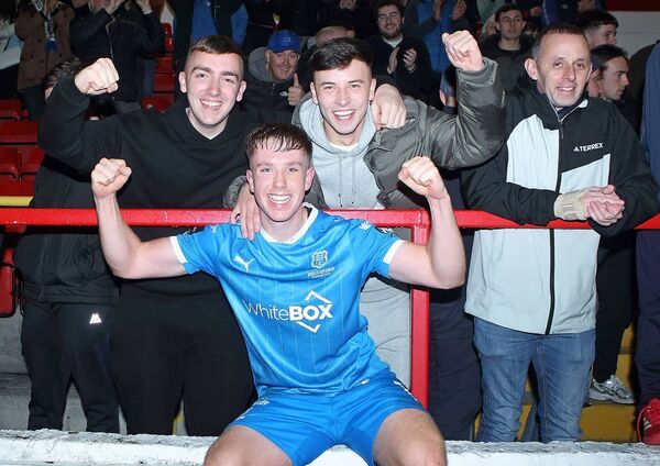 Sam Glenfield celebrates with fans after the game. It was his goal that won the game and kept Waterford in the LOI Premier Division. 