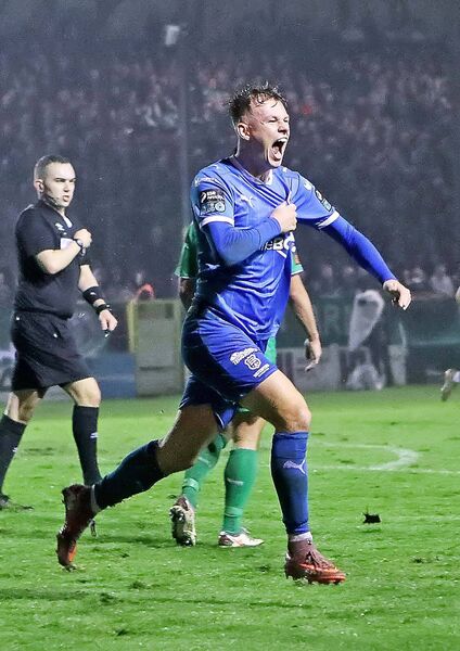Conan Noonan celebrates his equalising goal in front of the travelling Waterford fans.