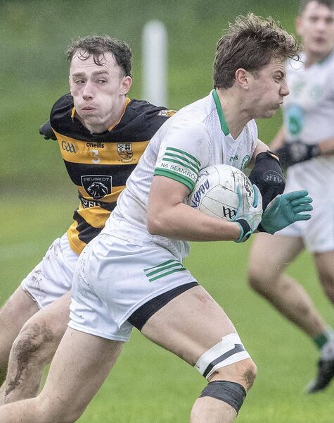 Shamrock's Ivan O’Neill in possession against Buttevant's Kevin Lenahan during their Munster Club Junior Football match in Fraher Field. Shamrock's Ivan O’Neill in possession against Buttevant's Kevin Lenahan during their Munster Club Junior Football match in Fraher Field.